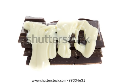 Picture of a bunch of chocolate with white chocolate poured over