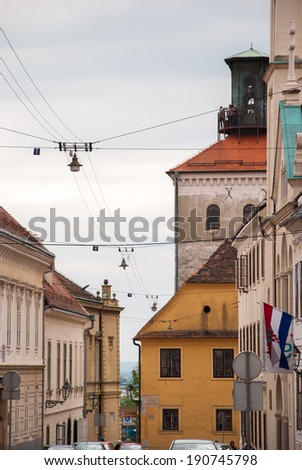 ZAGREB, CROATIA - APRIL 12, 2014 - Street view at Cirilometodska street and Lotrscak Tower in Zagreb, Croatia.