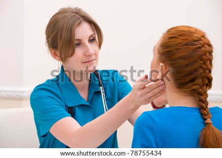 Doctor and patient discussing at doctor's office
