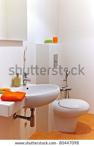 Interior of a bath room with sink and bawl