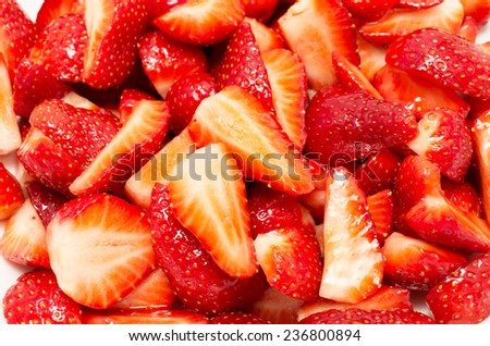 Background texture of sliced strawberries marinated in sugar