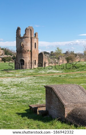 Ruins of the Circus of Maxentius lie in the spring sun along the ancient Appian Way in Rome, Italy.