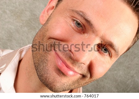 smiling handsome man - face close up 2