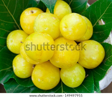 Group of plums with leaf