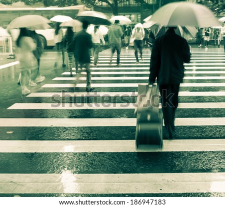 business people on zebra crossing street,blurred motion image