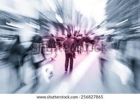 City business people walking in the commercial street, blurred motion background