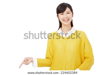 Japanese woman pointing down