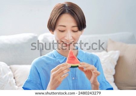 Similar – Image, Stock Photo Woman eating watermelon