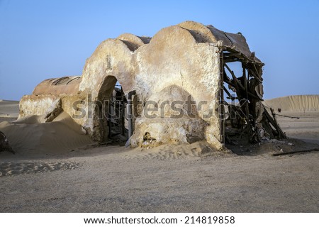 SAHARA, TUNISIA - AUGUST 18, 2014: Abandoned sets for the shooting of the movie Star Wars in the Sahara desert on a background of sand dunes in Sahara, Tunisia