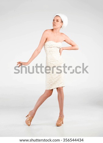 women wearing white evening dress and white hat Stock fotó © 