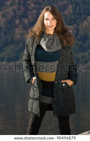 Model with the latest fashion this fall with lake in background /Fall Fashion at the lake