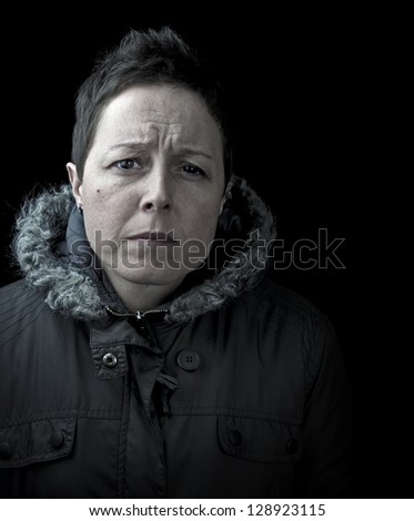 serious, stern looking woman black and white with copy space