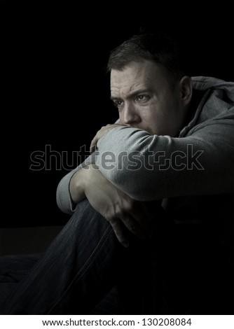 cold, man sitting on floor in depression or feeling cold with copy space
