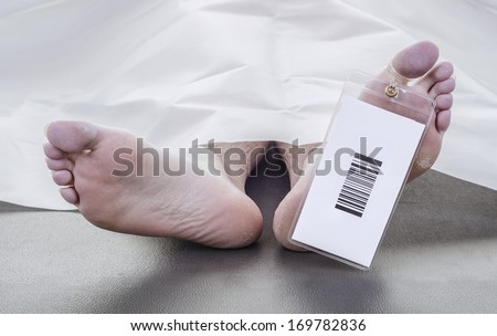 deceased man with a bar code on his toe tag, covered in a white sheet