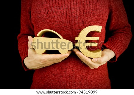 buying car, woman holding gold car and euro
