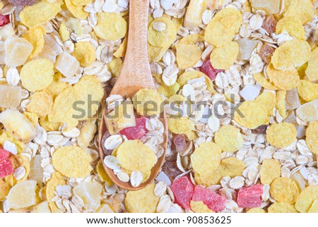 Macro view of healthy muesli with spoon full of muesli.