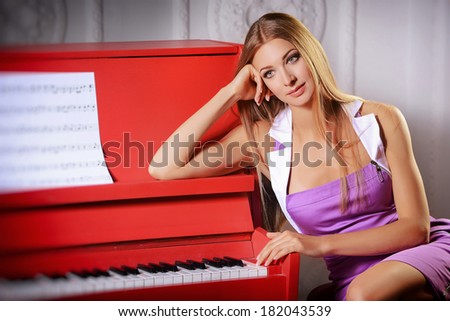 young woman and a piano
