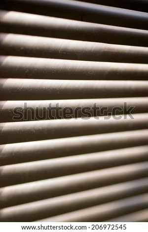 Closed metal blinds on the window