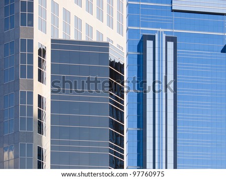Abstract view of modern downtown skyscraper office windows. This is Calgary office building in downtown. Many Oil company\'s headquarters are in Calgary.