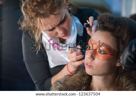 GALATI, ROMANIA - NOVEMBER 24: Make-up session in National Student Fashion Festival Extravagance on November 24, 2012 in Galati, Romania