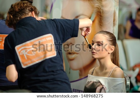 BUCHAREST, ROMANIA - JUNE 12: Make-up session in Bucharest Fashion Week in June 12, 2013 in Bucharest, Romania
