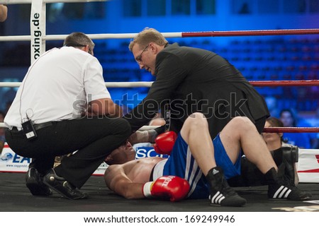 GALATI, ROMANIA - AUGUST 23: Ionut Trandafir got knocked out by Flavius Biea fight at the WBO welterweight title,  on August 23, 2013, in Galati, Romania.