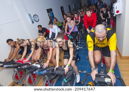BUCHAREST, ROMANIA - AUGUST 20, 2013: Spinning marathon challenge. Charity sport event organized by World Master Class, on August 20, 2013, in Romexpo at Bucharest, Romania
