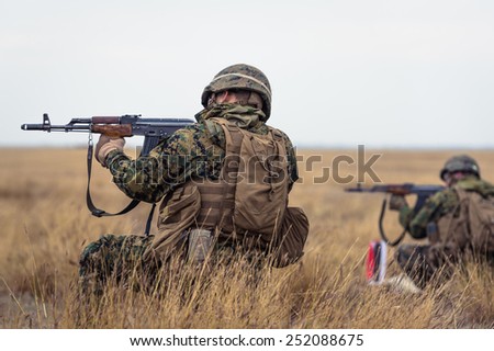 GALATI, ROMANIA - OCTOBER 8: US Marines with semiautomatic rifle on the firing line in Romanian military polygon in the exercise Smardan Danube Express 14 on Galati, Romania, 8 october 2014.
