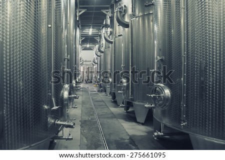 Focsani, Romania - October 16: Stainless steel fermenters used to make wine inside winery Garboiu, on 16 October, 2014, Focsani, Romania