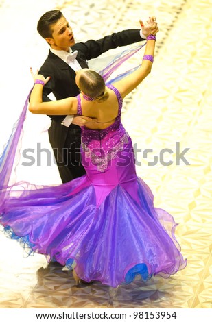 BUCHAREST, ROMANIA - MARCH 18: An unidentified dance couple in a dance pose at Ten Dance Championship, March 18, 2012 in Bucharest, Romania