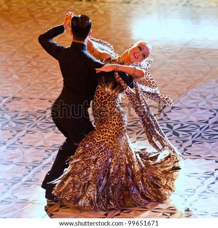 BUCHAREST, ROMANIA - MARCH 31: An unidentified dance couple in a dance pose at Dance Master, March 31, 2012 in Bucharest, Romania