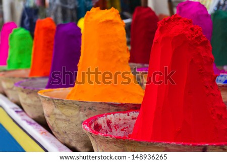 Piles of colorful powdered dyes used for holi festival. An Indian shop