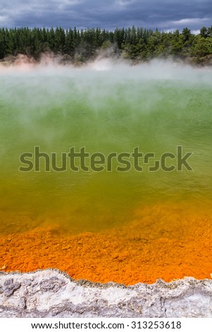 Colourful bubbling lake heated by volcanoes, Thermal Wonderland in Waiotapu Volcanic Valey, Taupo Volcanic Zone, Rotorua, New Zealand