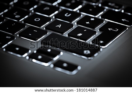 illuminated keyboard keys of portable computer notebook