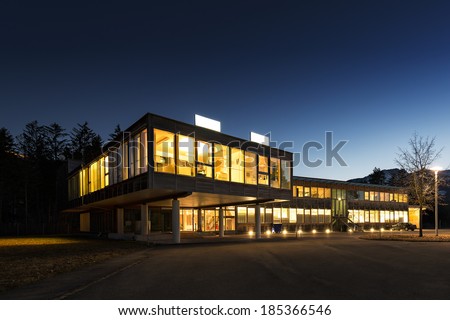 ecological energy saving wooden office building at night