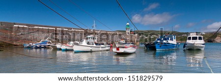 Panorama of small boats in a harbour at Port Erin on the Isle of Man.