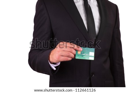 Businessman holding credit card, isolated on white background