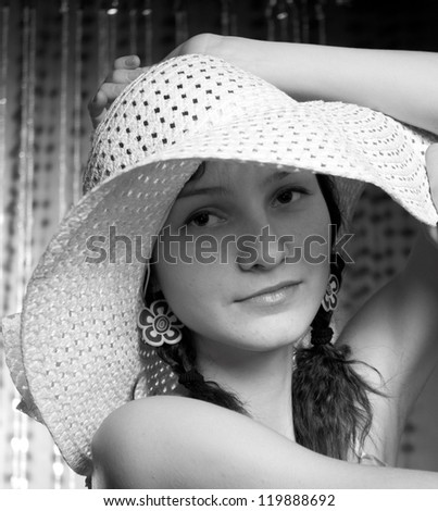 pretty girl in a white hat and tunic