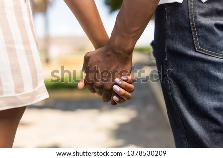 Similar – Image, Stock Photo Romantic black couple embracing on street