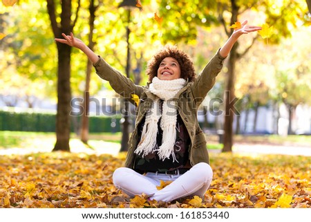 Autumn outdoor portrait of beautiful African American young woman  - Black people