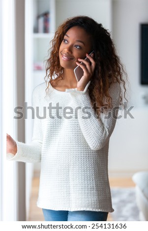 African American woman talking on a mobile phone - Black people