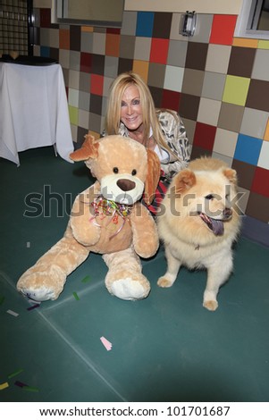 LOS ANGELES, CA - MAY 3: Joan Van Ark, dog Goldie at the grand opening of the Pooch Hotel on May 3, 2012 in Hollywood, Los Angeles, California.
