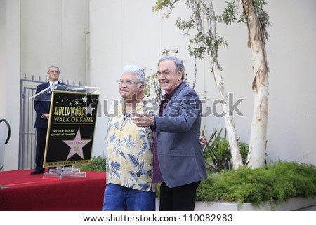 LOS ANGELES - AUG 10: Neil Diamond, Randy Newman at a ceremony honoring Neil Diamond with the 2,475th Star on the Hollywood Walk of Fame on August 10, 2012 in Los Angeles, California