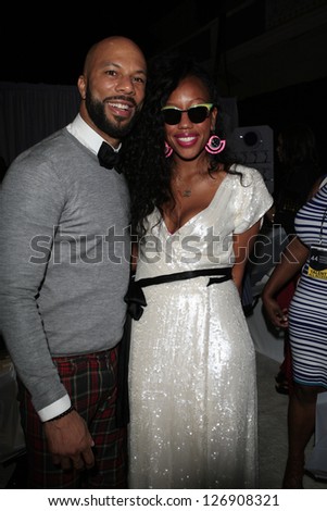 LOS ANGELES - FEB 1: Common, guest Kristen in the Bellafortuna Entertainment gifting suite at the NAACP awards on February 1, 2013 in Los Angeles, California