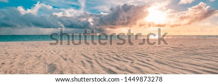 Closeup of sand on beach and blue summer sky. Panoramic beach landscape. Empty tropical beach and seascape. Orange and golden sunset sky, soft sand, calmness, tranquil relaxing sunlight, summer mood ストックフォト © 
