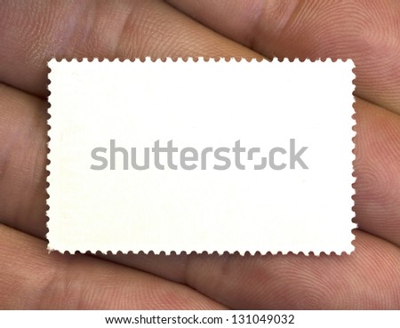 closeup of a blank stamp in a hand