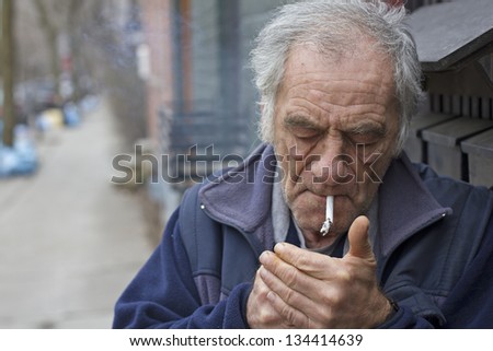italian man smoking on the street