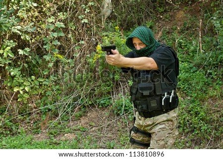 Special Forces soldier, armed terrorist