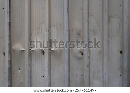 Image, Stock Photo Bright red steel doors in the shimmering silver corrugated metal façade of a modern aircraft hangar at the glider airfield in Oerlinghausen near Bielefeld on Hermannsweg in the Teutoburg Forest in East Westphalia-Lippe