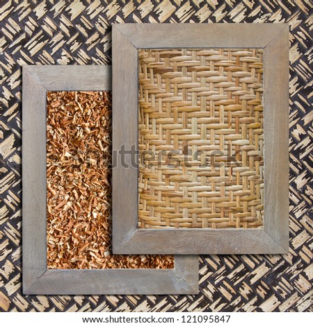 Woven with bamboo sawdust in wooden frames on a bamboo background.